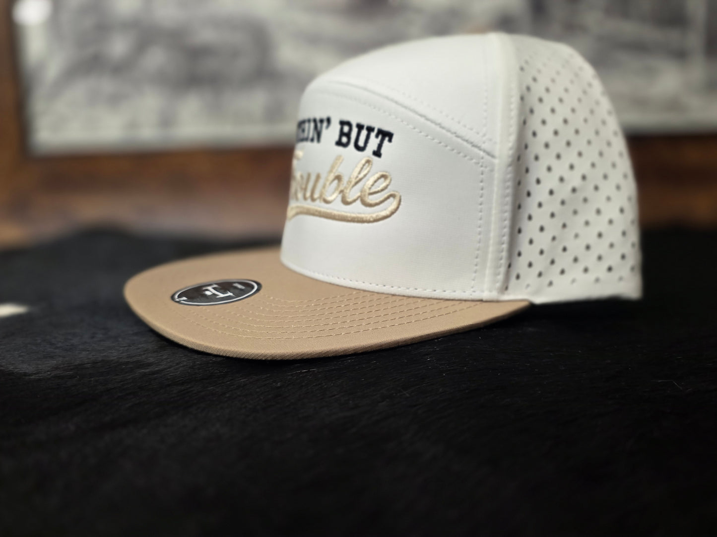 NOTHIN' BUT TROUBLE. Beige and white 7 panel snapback.