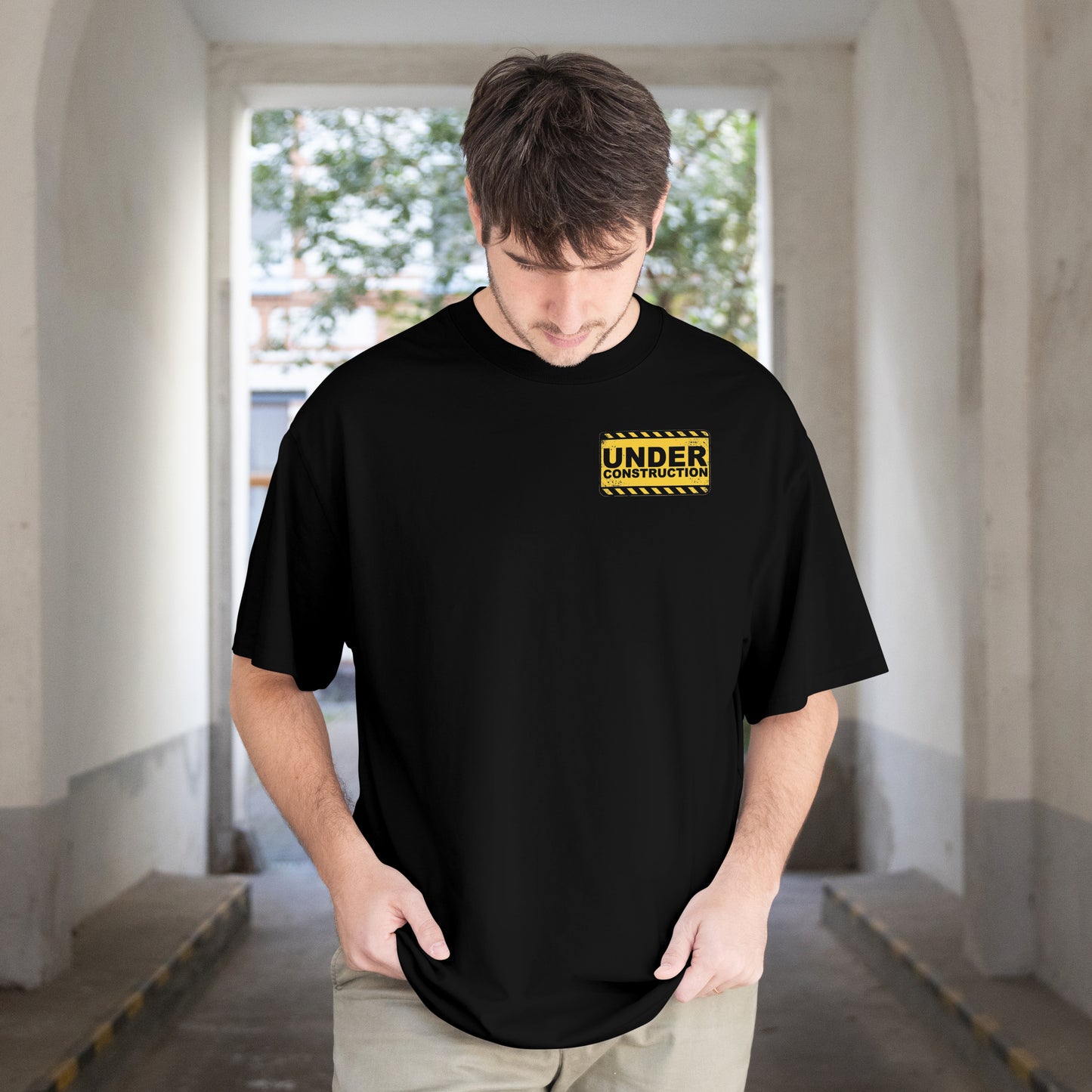 A CHRISTIAN UNDER CONSTRUCTION TEE.