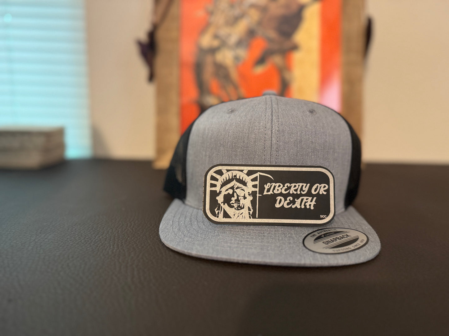 BLACK TO SILVER LIBERTY OR DEATH LEATHER PATCH WITH HAT.