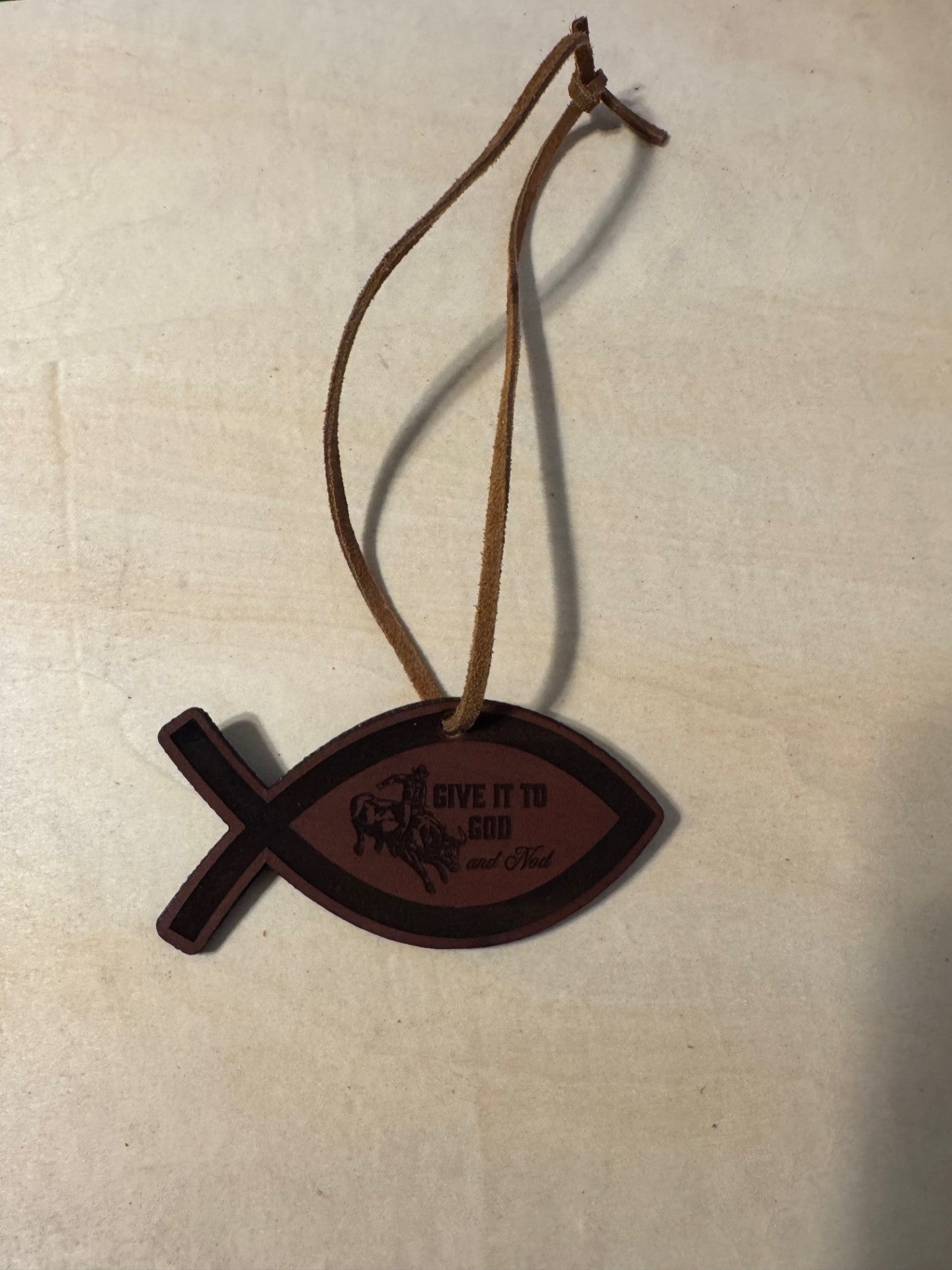 Give it to God and nod cowboy on bull rearview mirror charm