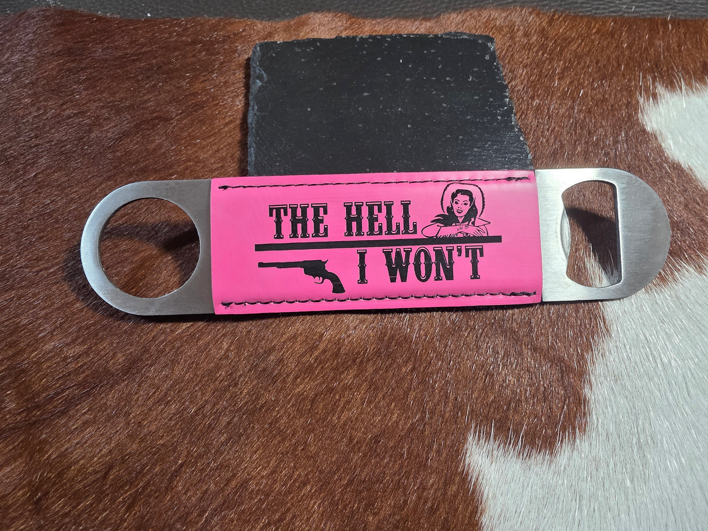 The H#@! I WONT lasered pink bottle opener.