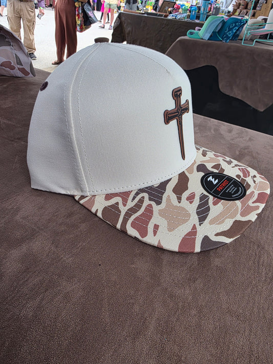 Nail cross patched Camo bill snap back hat. Water repellent!