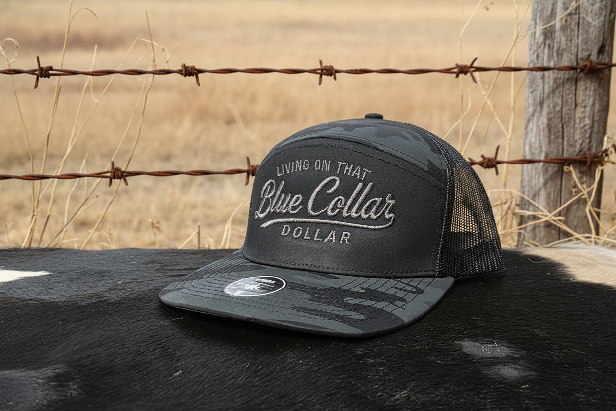 Blue collar embroidered snapback hat. 2 tone black camo