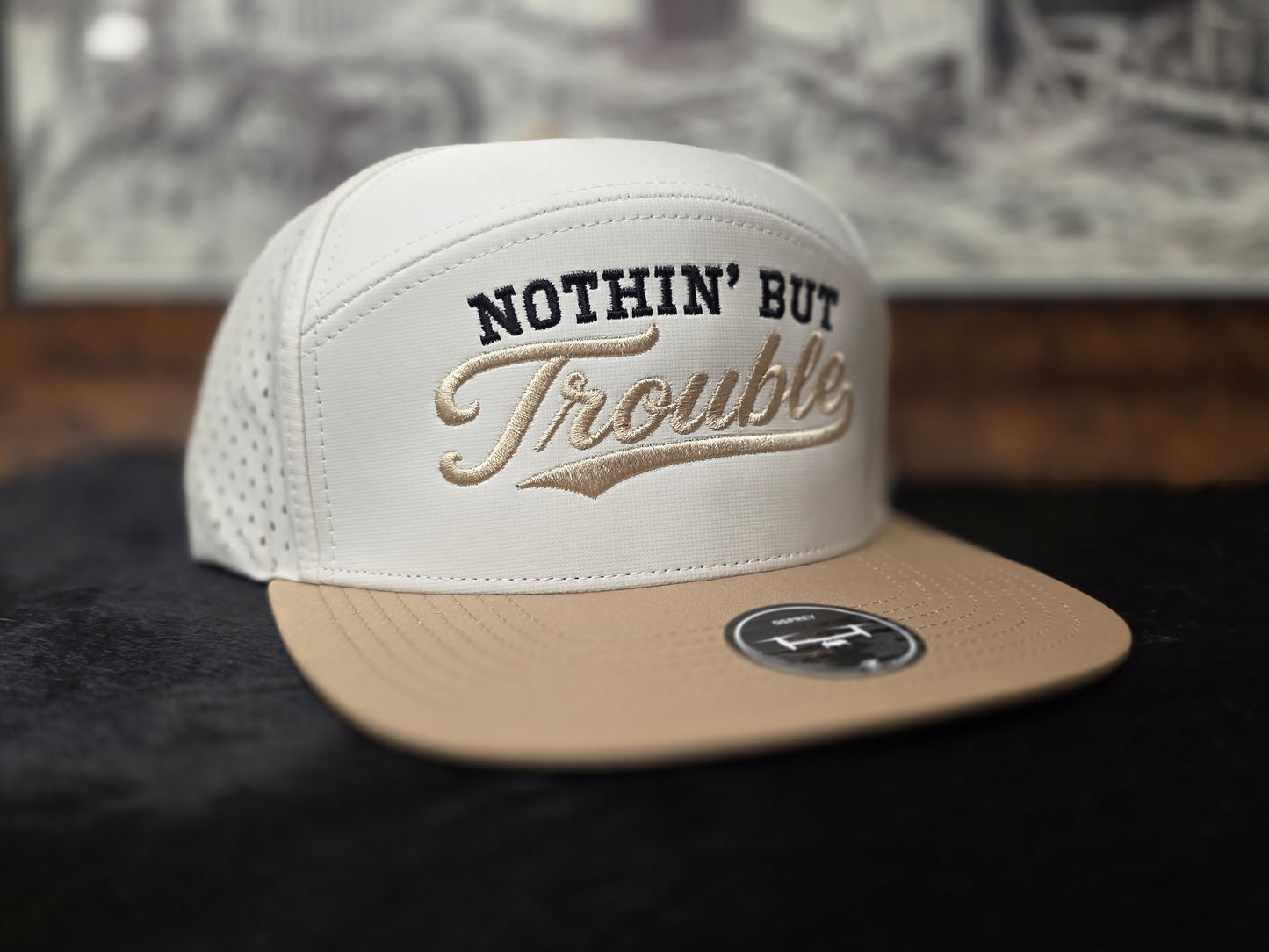 NOTHIN' BUT TROUBLE. Beige and white 7 panel snapback.