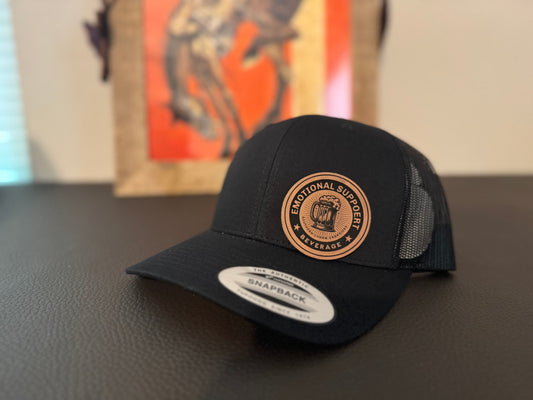 EMOTIONAL SUPPORT BEVERAGE PATCH IN RAWHIDE WITH HAT.
