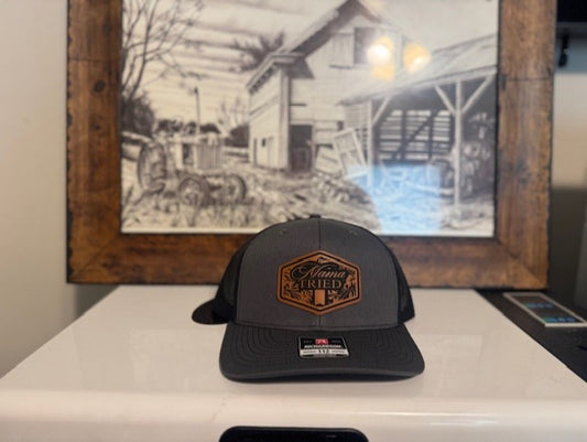 MAMMA TRIED rawhide leather patched snap back.