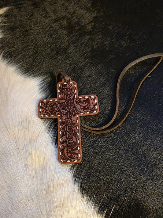 Hand stitched leather rearview mirror cross. Providence design.