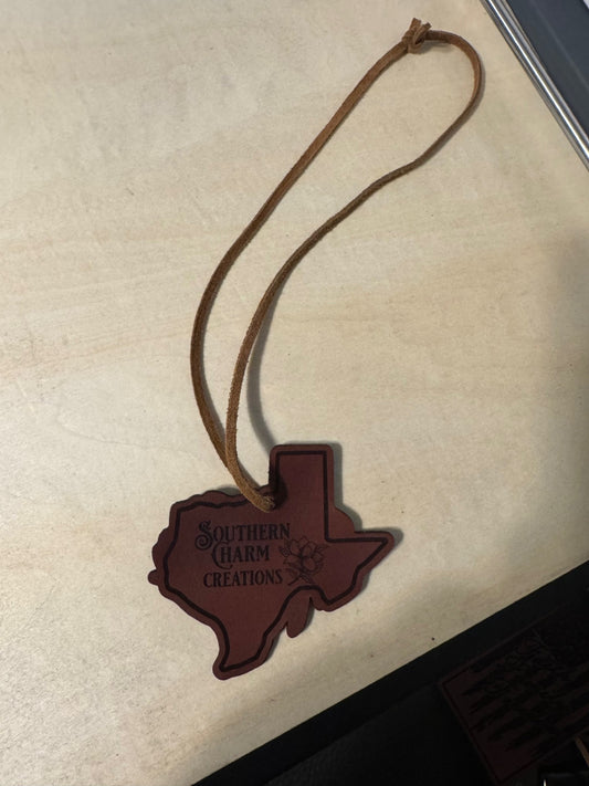 Texas made leather rearview mirror charm.